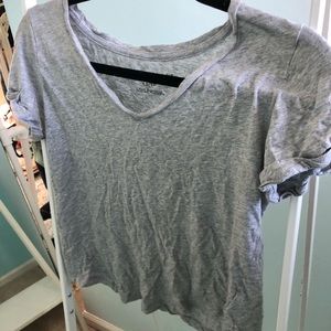 Grey v-neck, size Xs.
